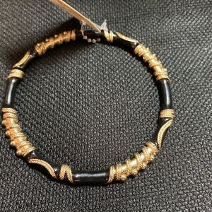 Elegant Fashion Bangle Bracelet - New with Tags - Black and Gold in color
